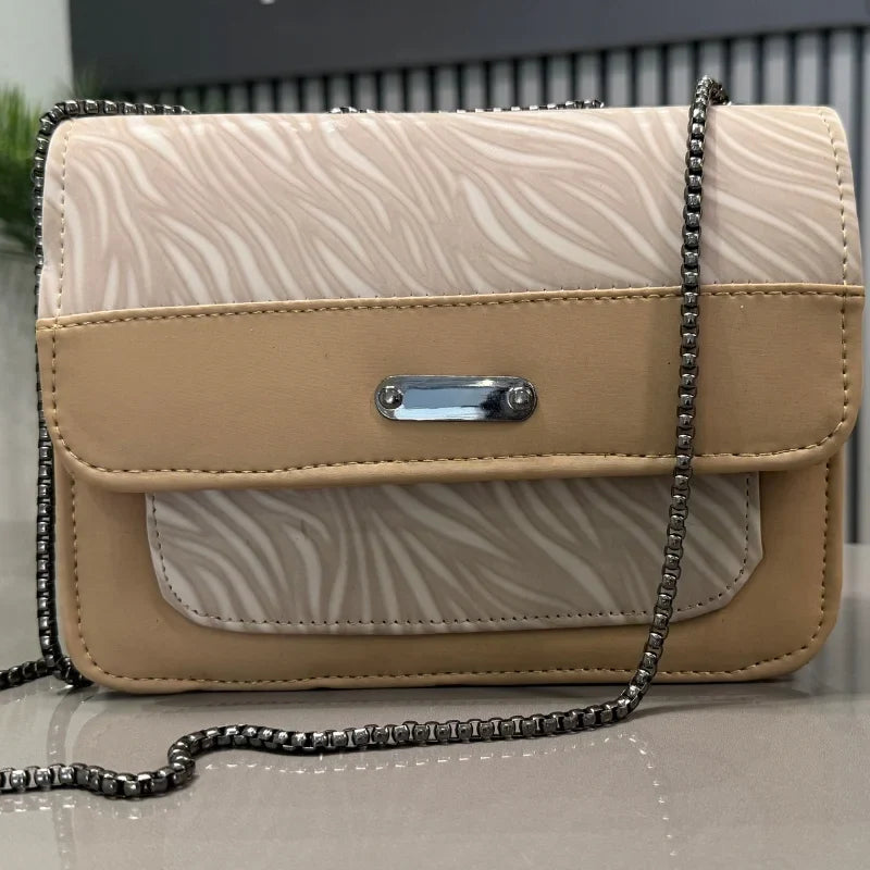 Luxury Women’s Shoulder Bag in Beige Faux Leather for Casual, Work, and Formal Use Elegant faux leather shoulder bag